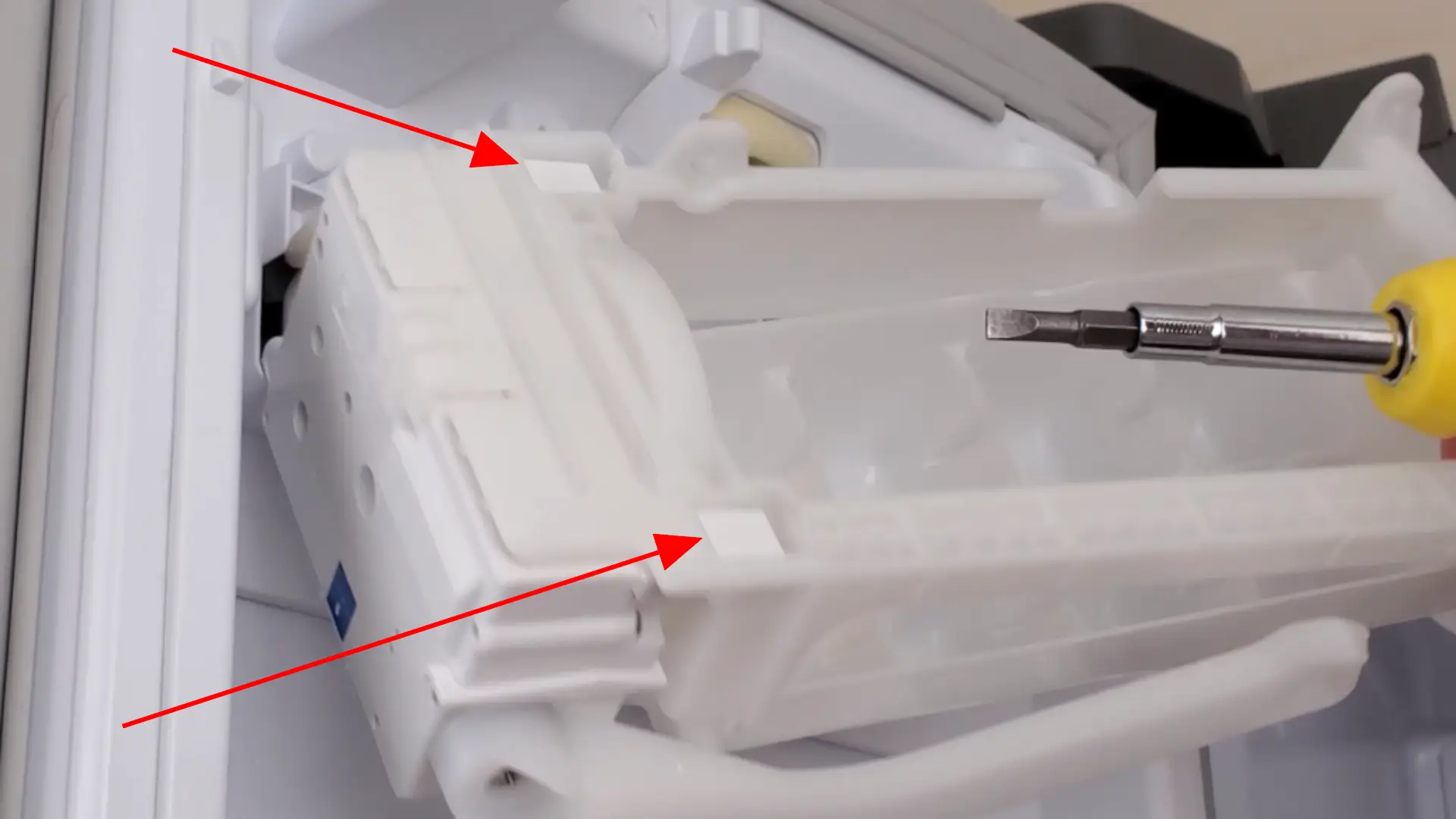 detaching the ice tray