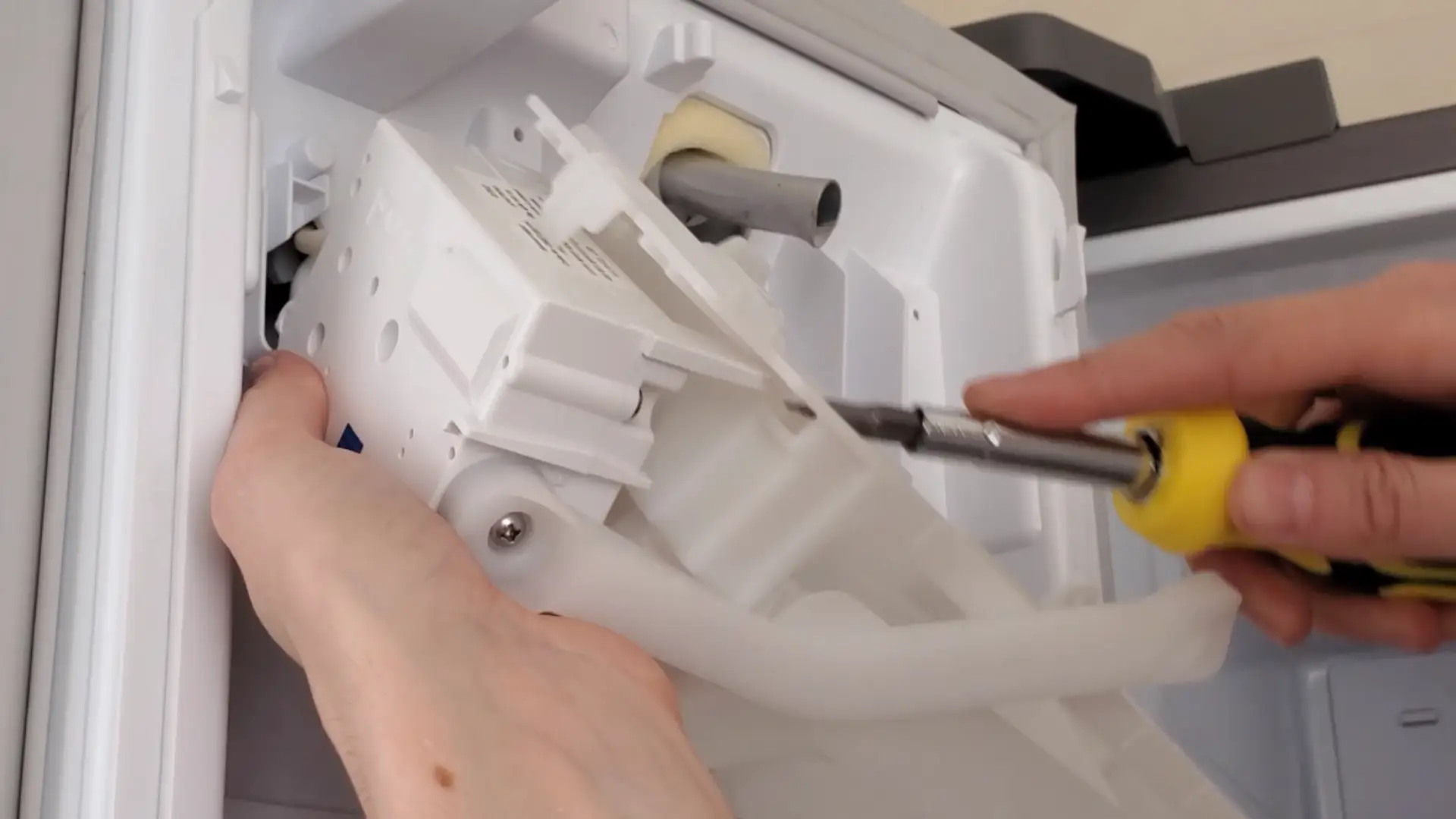 detaching the ice tray