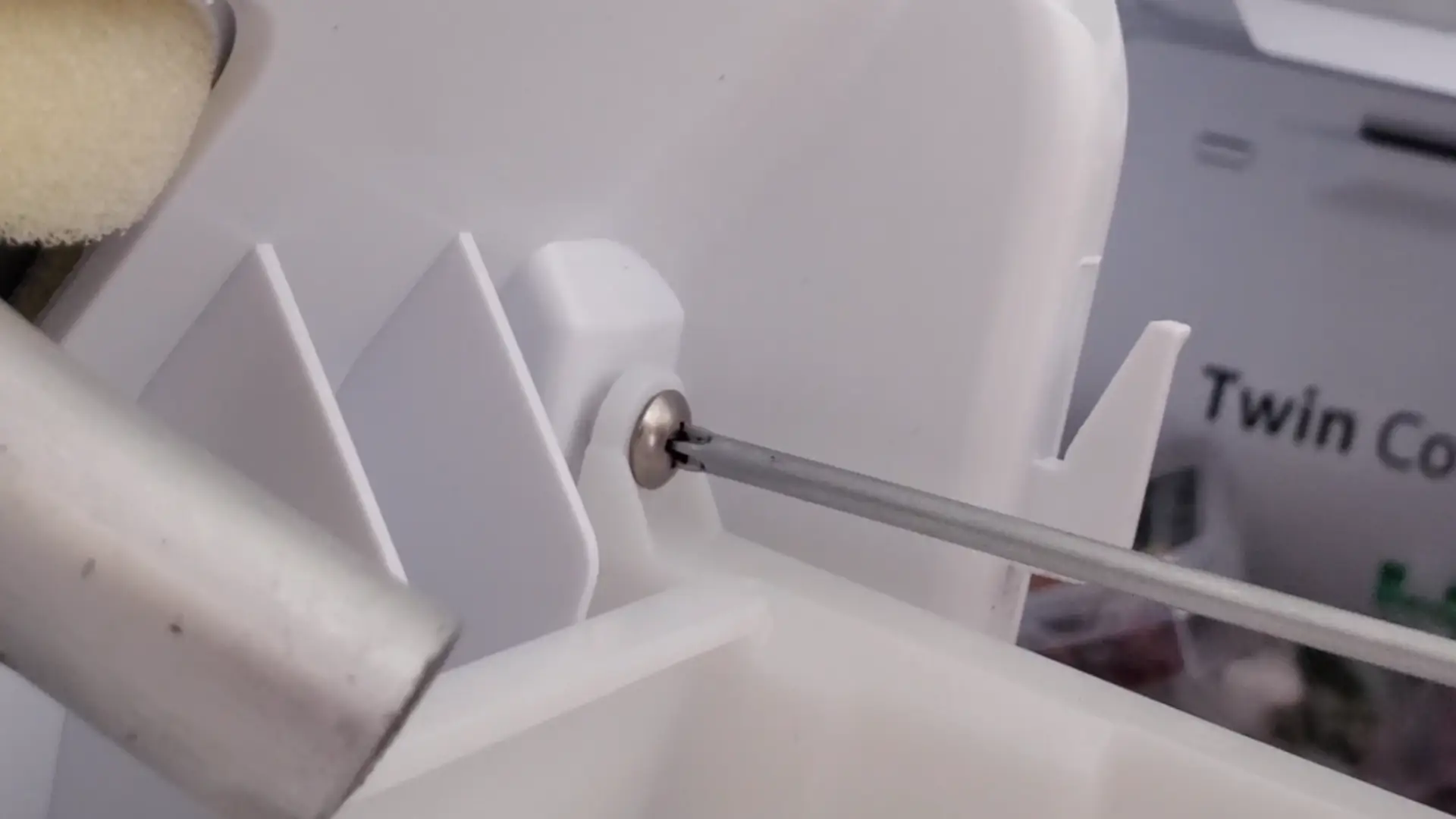 inserting the ice tray back